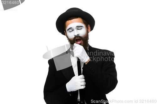 Image of portrait of a man as mime with tube or retro style microphone