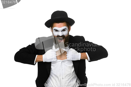 Image of mime as a businessman tearing his shirt off 