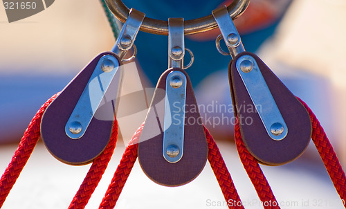 Image of Three sailing pulleys