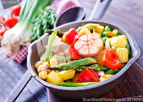 Image of baked meat with vegetables