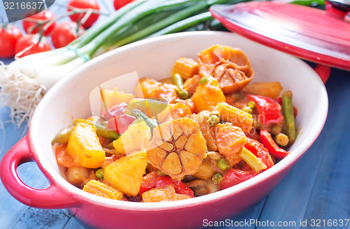 Image of baked meat with vegetables