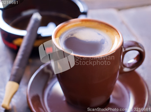 Image of coffee and sigarette