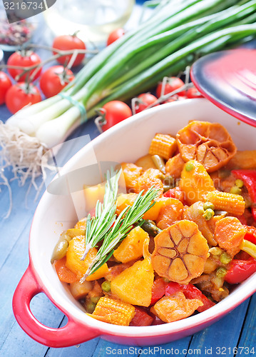 Image of baked meat with vegetables