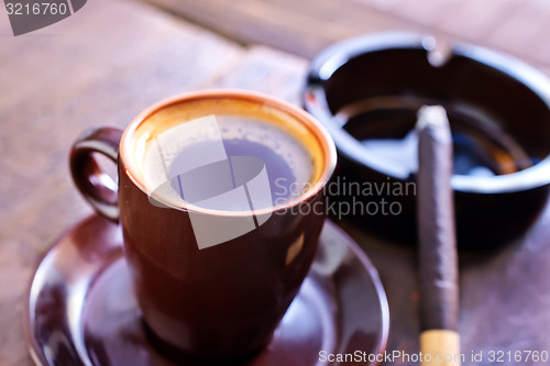 Image of coffee and sigarette