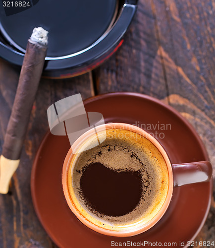 Image of coffee and sigarette