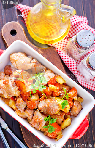 Image of fried meat with vegetables