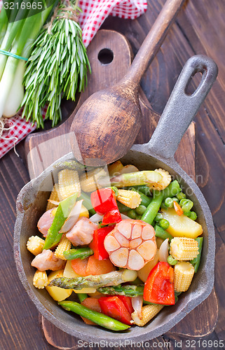 Image of baked meat with vegetables