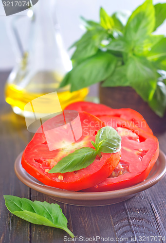 Image of tomato with basil