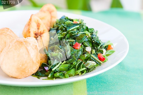 Image of Callaloo Vegetable (Spinach) and Friend Dumplings - Caribbean St