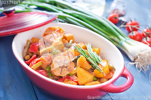 Image of baked meat with vegetables