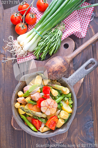 Image of baked meat with vegetables