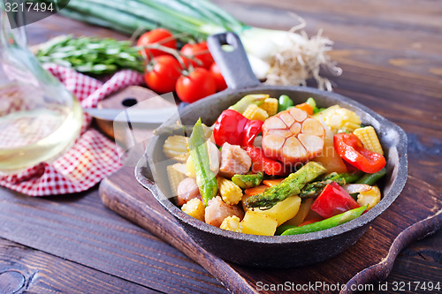 Image of baked meat with vegetables