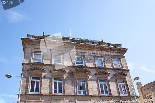 Image of detailed architecture against a blue sky