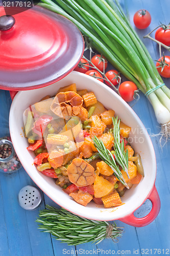 Image of baked meat with vegetables