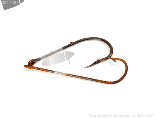 Image of Old rusty fishhooks in form of heart