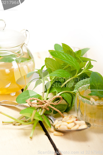 Image of Arab traditional mint and pine nuts tea