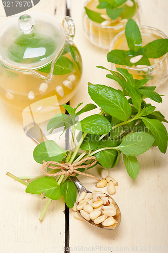 Image of Arab traditional mint and pine nuts tea