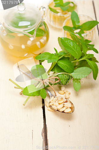 Image of Arab traditional mint and pine nuts tea