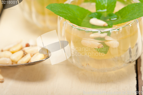 Image of Arab traditional mint and pine nuts tea