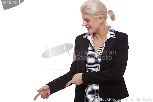 Image of Businesswoman Pointing Up While Looking at Camera