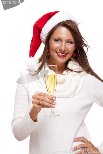 Image of Playful woman celebrating Xmas blowing a kiss