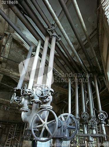 Image of Old creepy, dark, decaying, destructive, dirty factory