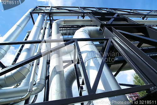 Image of Industrial zone, Steel pipelines and valves against blue sky