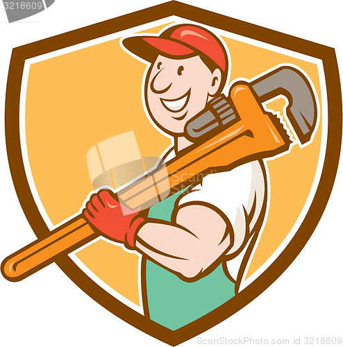 Image of Plumber Smiling Holding Monkey Wrench Crest