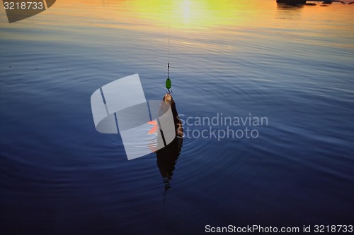 Image of Sunset river perch fishing with the boat and a rod