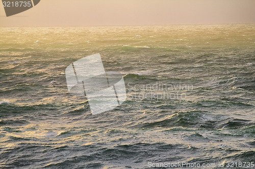 Image of Arctic ocean, cold sun and fog