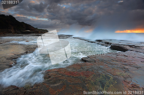 Image of Waves smash against the rocks at Coledale