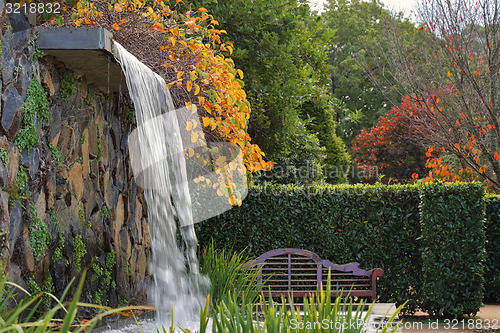 Image of Zen garden with waterfall in Autumn