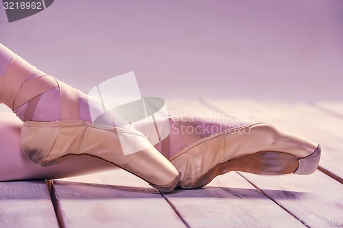 Image of Close-up ballerina\'s legs in pointes