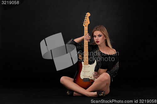 Image of Beautiful girl  and guitar