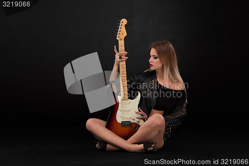 Image of Beautiful girl  and guitar