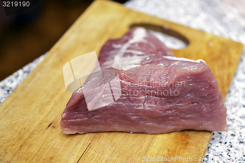 Image of Natural fresh meat on cutting board