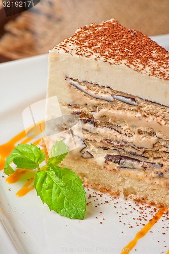 Image of chocolate cake with jam ice cream