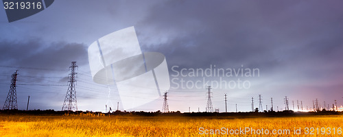 Image of Electrical Storm Thunderstorm Lightning over Power Lines South T