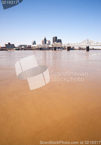 Image of Muddy Ohio River After Flooding Vertical Skyline Louisville Kent