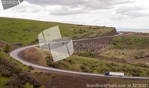 Image of Open Road Semi Trucks Travel Curved Highway Oregon Countryside