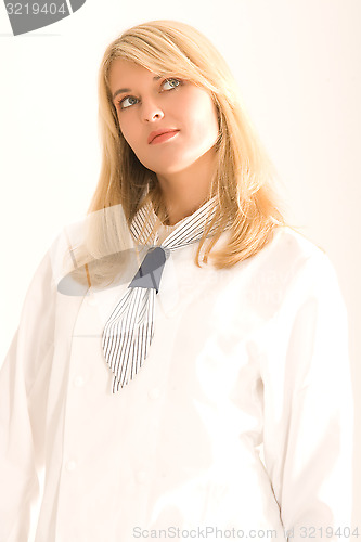 Image of Young woman with chef's jacket