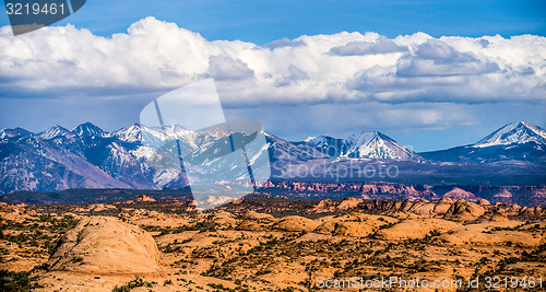 Image of canyon badlands and colorado rockies lanadscape