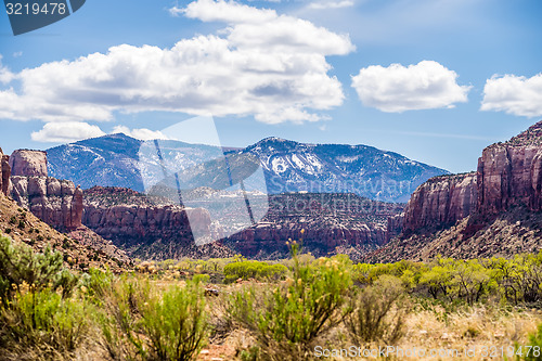 Image of canyon badlands and colorado rockies lanadscape