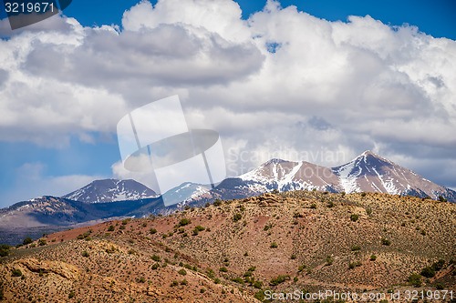 Image of canyon badlands and colorado rockies lanadscape