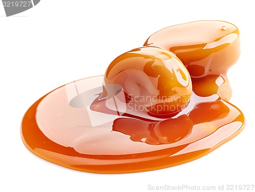 Image of caramel candies and sauce