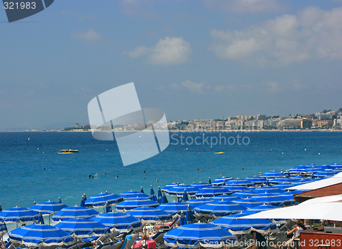 Image of Beach with blue umbrellas 2