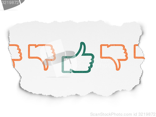 Image of Social network concept: thumb up icon on Torn Paper background