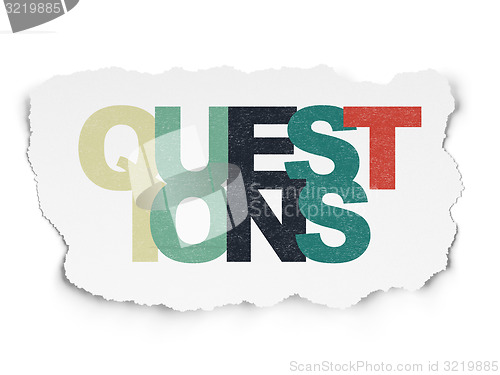 Image of Education concept: Questions? on Torn Paper background