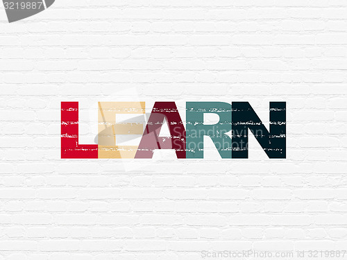 Image of Education concept: Learn on wall background