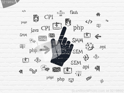 Image of Web development concept: Mouse Cursor on wall background